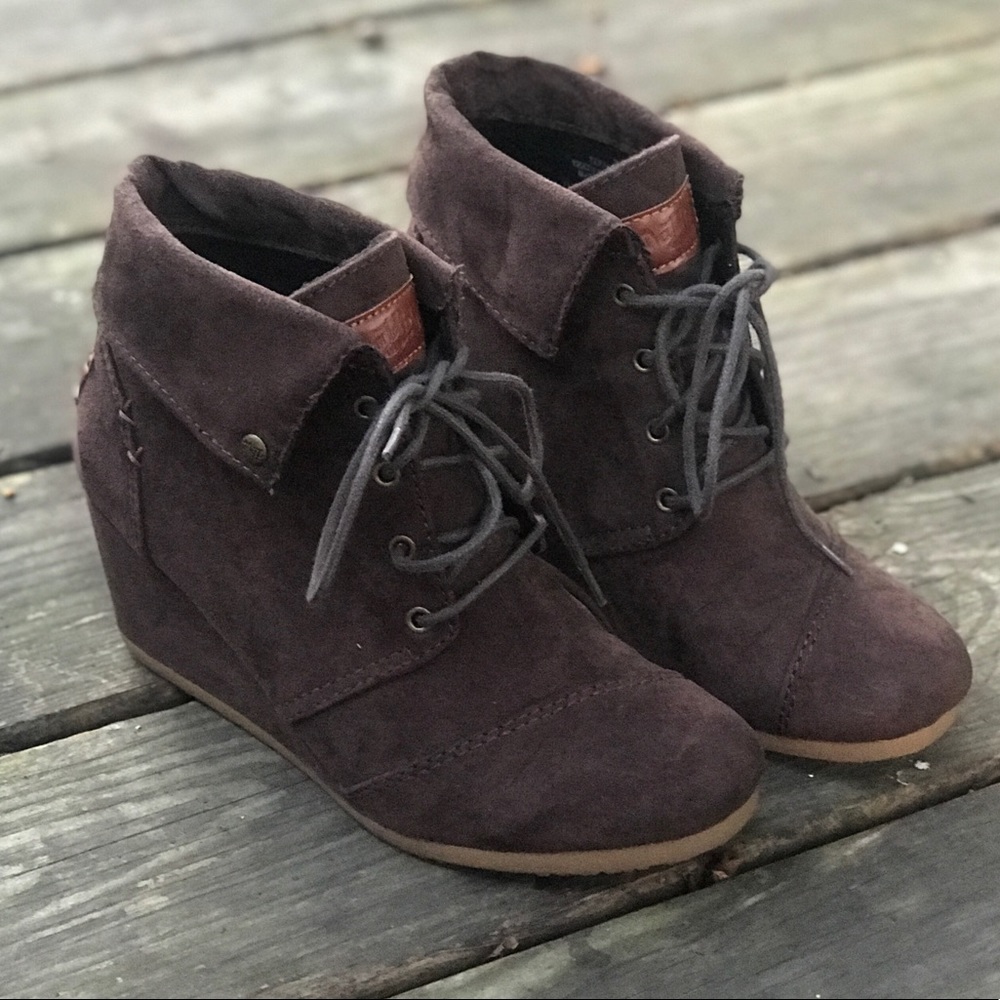 Brown suede wedges.